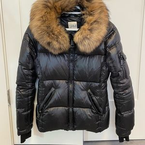 Used SAM puffer with FUR. Black. Size small. Very good condition.